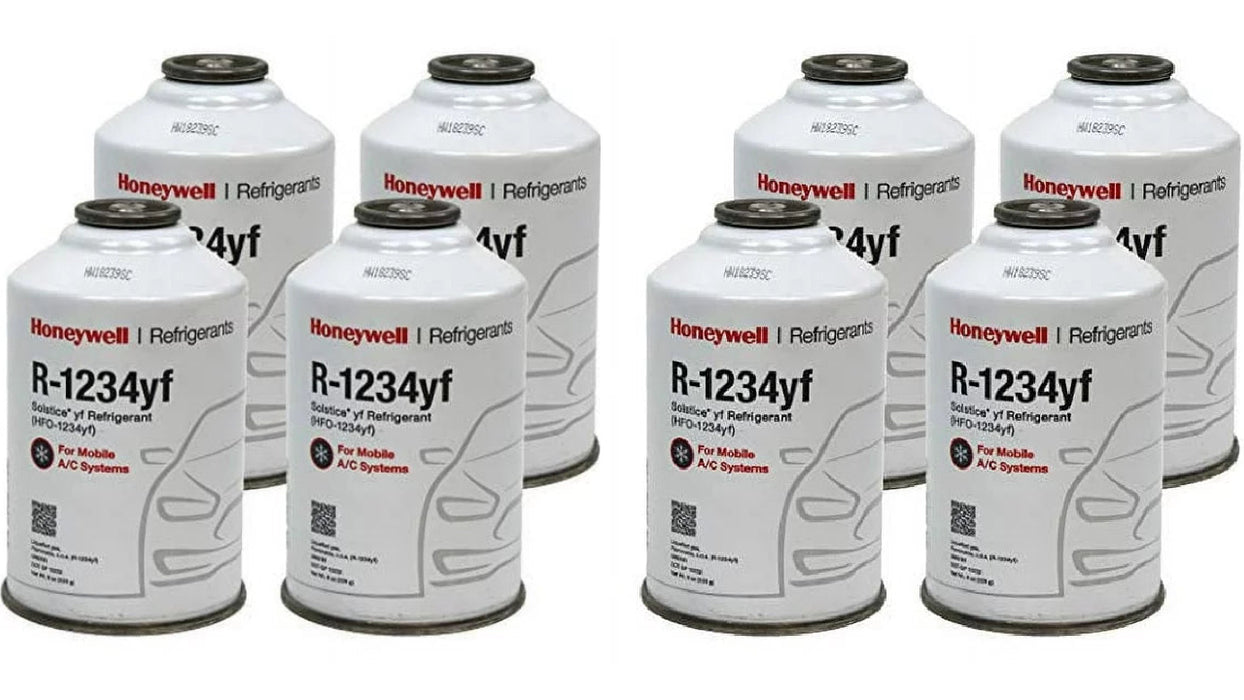 Eight cans of Honeywell R-1234yf Solstice® refrigerant for mobile A/C systems, arranged in two rows.
