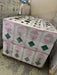 Wrapped pallet of R-410A refrigerant cylinders stored in a warehouse environment