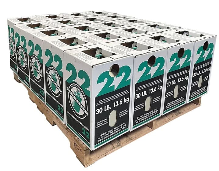 Stack of 10 factory-sealed 30 lb R-22 refrigerant cylinders on a pallet, labeled as 100% virgin product.